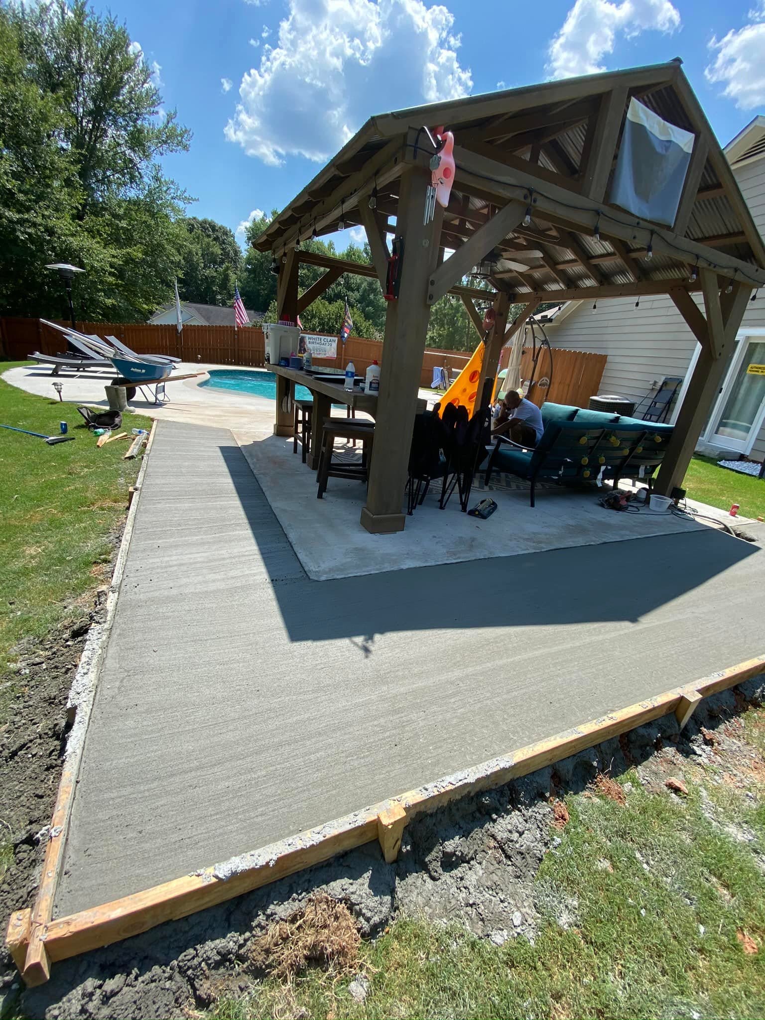 An outdoor living concrete patio extension poured by Multiple Personnel Company in northeast GA