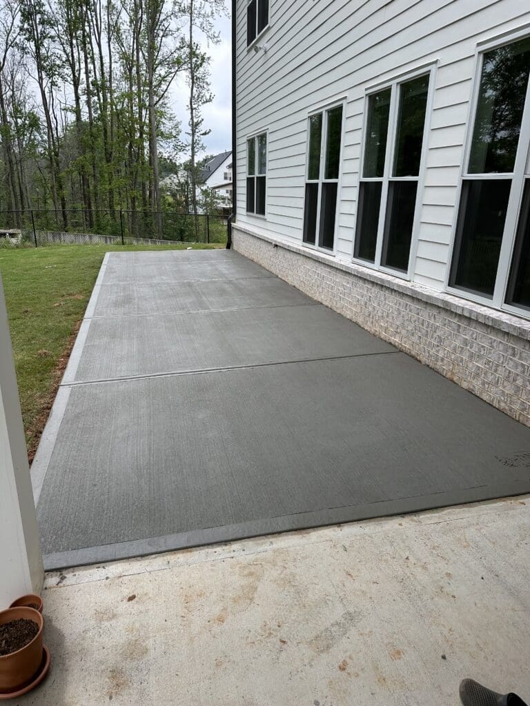 Professional concrete flatwork patio extension project in North Georgia